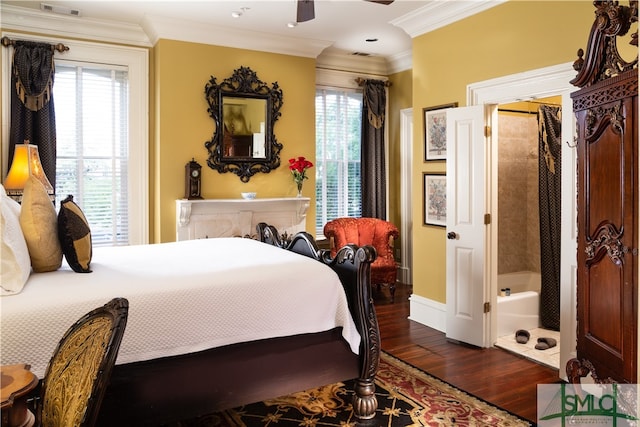 bedroom with ceiling fan, crown molding, and dark wood-type flooring