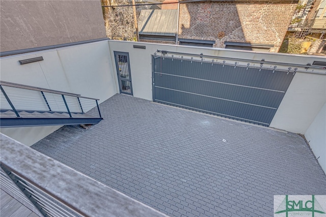 view of patio / terrace with a balcony