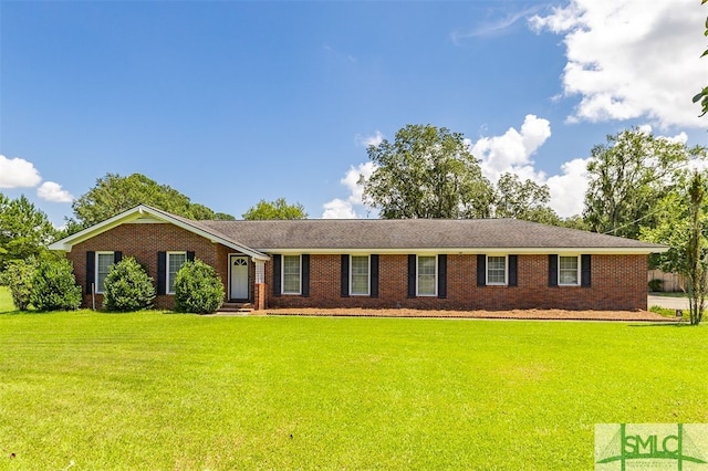 ranch-style house with a front lawn