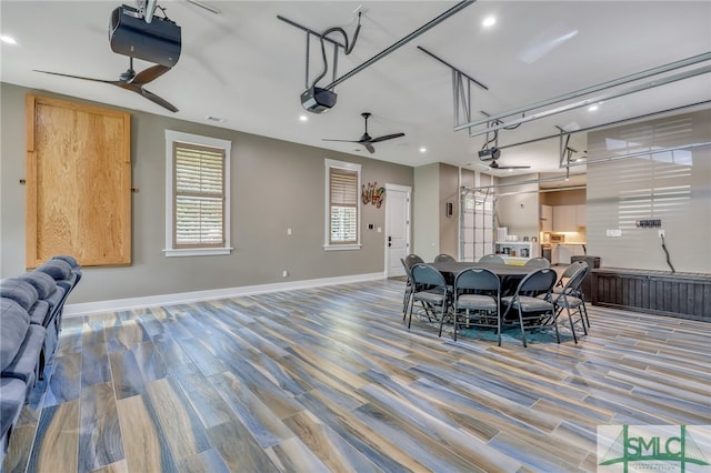 dining area with hardwood / wood-style floors and ceiling fan