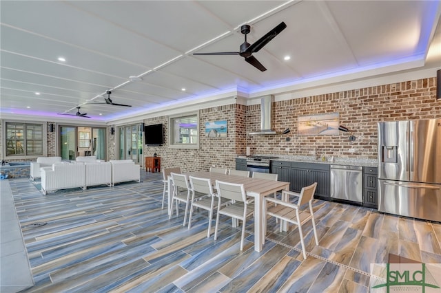 view of terrace featuring an outdoor living space and ceiling fan