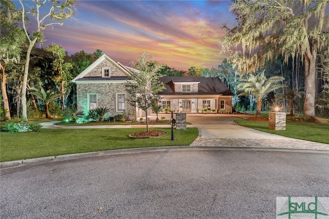 view of front of home featuring a yard