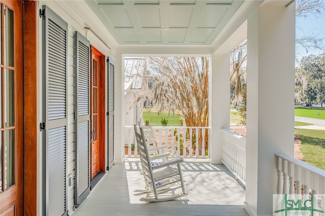 balcony featuring a porch