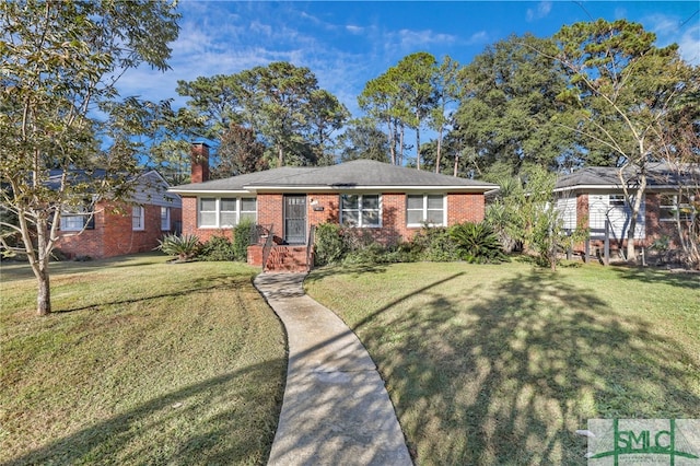 116 E 66th St, Savannah, GA 31405 - ranch-style house featuring a front yard