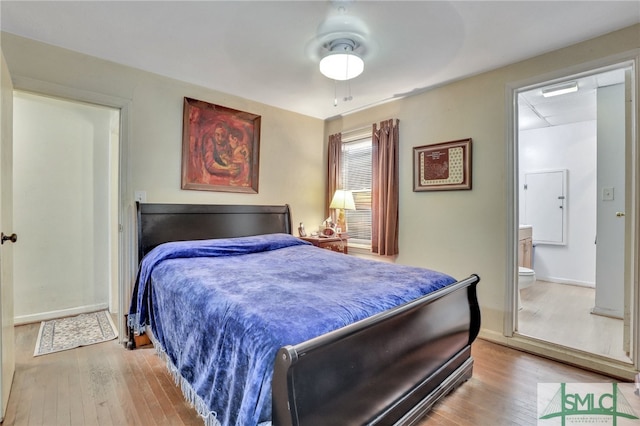 116 E 66th St, Savannah, GA 31405 - bedroom with ceiling fan, light wood-type flooring, and ensuite bath