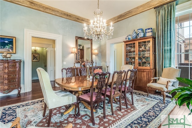 dining room with a notable chandelier and hardwood / wood-style flooring