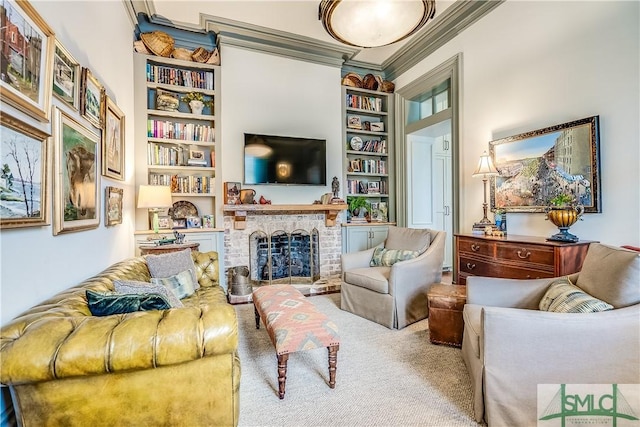 carpeted living room with ornamental molding, built in shelves, and a brick fireplace
