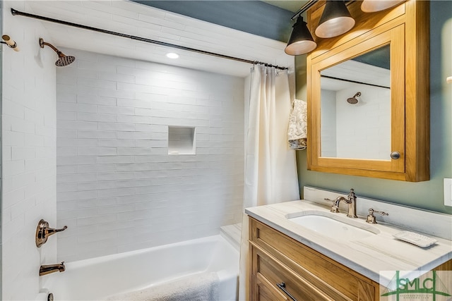 bathroom featuring shower / bath combination with curtain and vanity