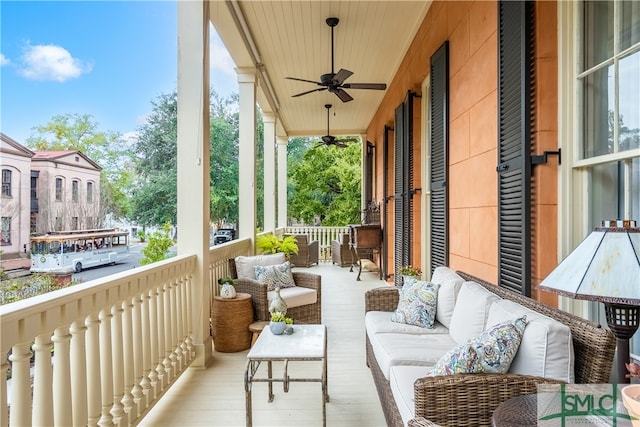 balcony featuring an outdoor hangout area, ceiling fan, and a porch