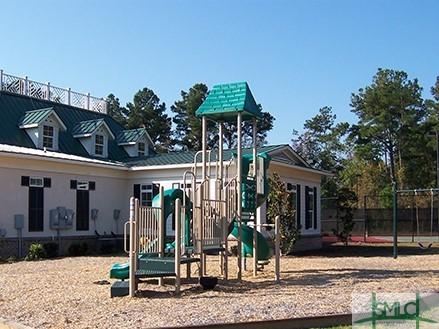 community jungle gym with fence