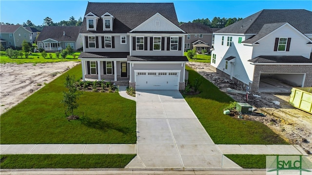 view of front facade with a front lawn and a garage