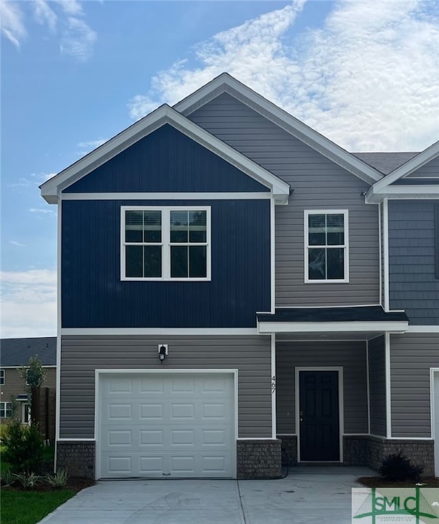 view of front of house with a garage