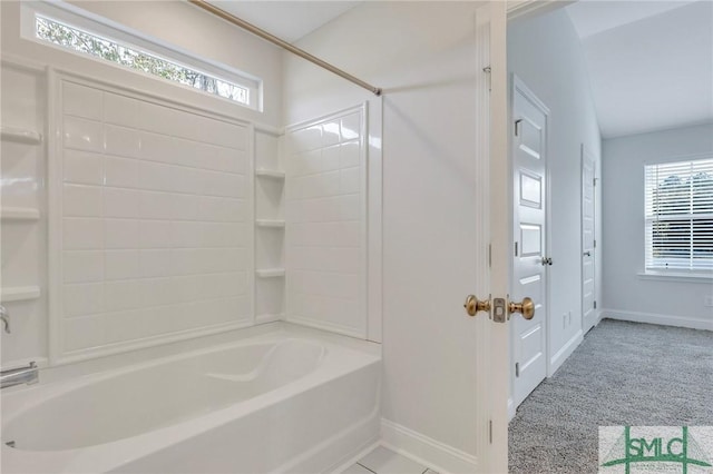 bathroom featuring  shower combination