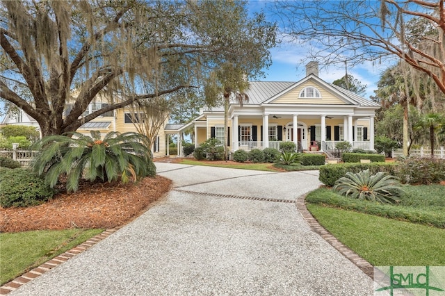 neoclassical home with a porch