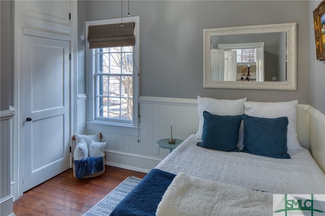 bedroom featuring dark wood-type flooring