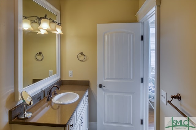 bathroom featuring vanity and wood-type flooring