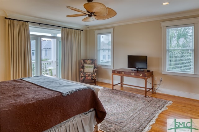 bedroom featuring ornamental molding, ceiling fan, access to outside, and light wood-type flooring