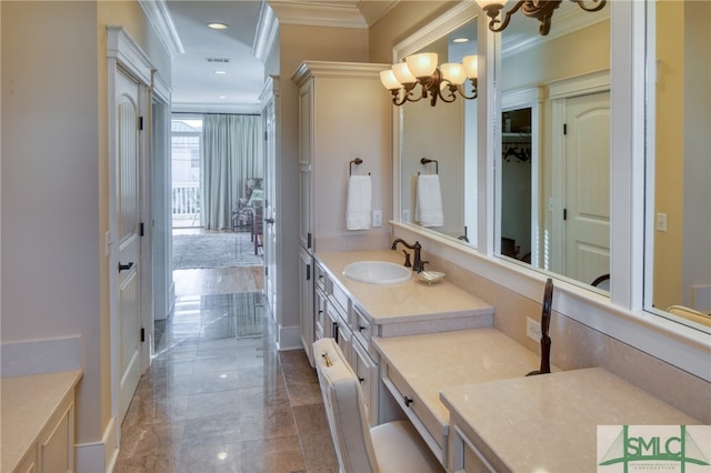 bathroom featuring crown molding, tile flooring, a notable chandelier, and vanity