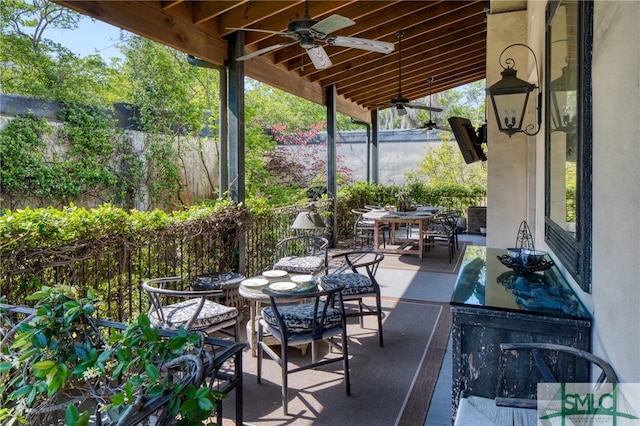 view of patio / terrace featuring ceiling fan