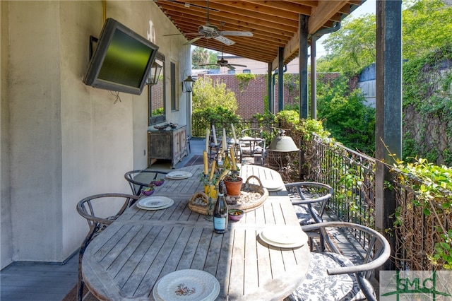 view of terrace featuring ceiling fan