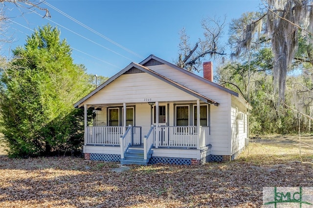 bungalow-style house with covered porch