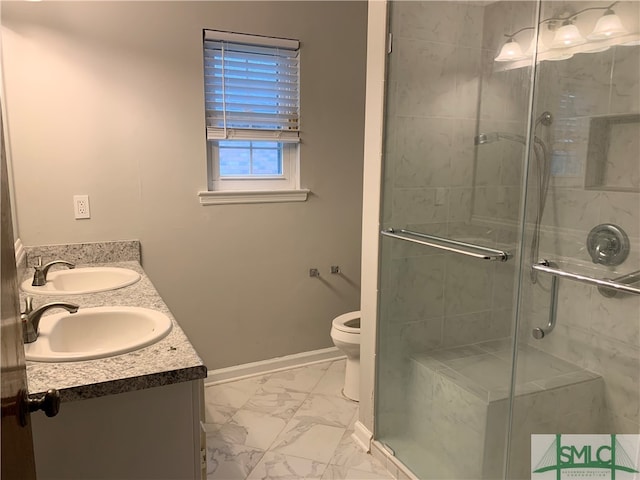 bathroom with an enclosed shower, toilet, dual bowl vanity, and tile flooring