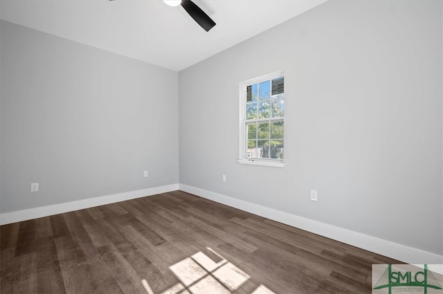 unfurnished room featuring ceiling fan and dark hardwood / wood-style floors