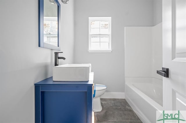 full bathroom with shower / washtub combination, toilet, tile floors, and vanity