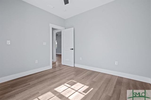 spare room featuring light hardwood / wood-style flooring