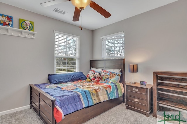 carpeted bedroom featuring ceiling fan