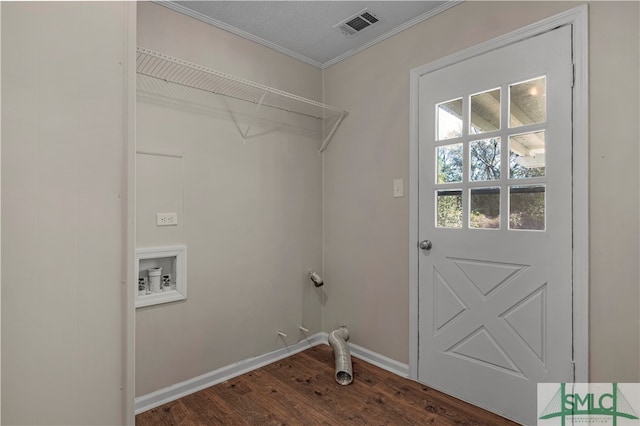 laundry room featuring crown molding, hookup for a washing machine, and dark hardwood / wood-style flooring