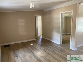 unfurnished room featuring light hardwood / wood-style flooring