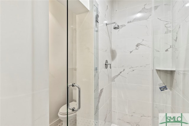 bathroom featuring walk in shower and toilet