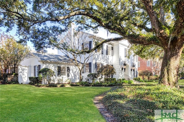 exterior space with a front yard