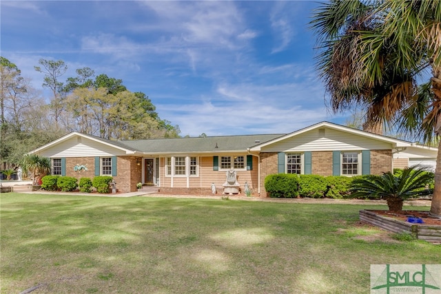 ranch-style home with a front yard