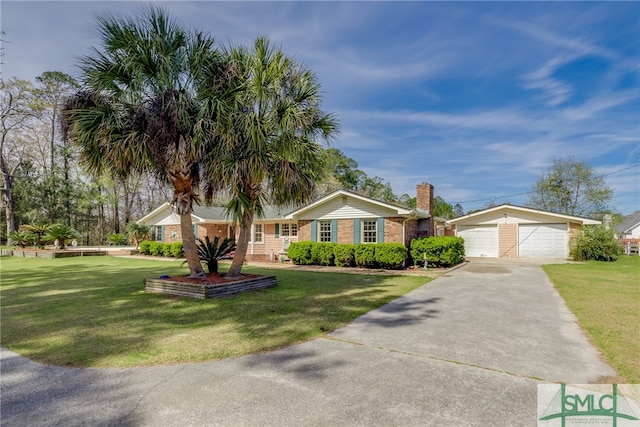 ranch-style home featuring a front lawn and a garage