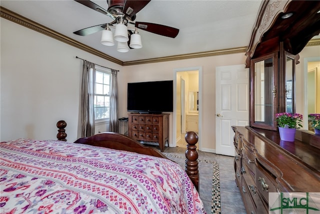 bedroom with crown molding, dark tile floors, ceiling fan, and connected bathroom