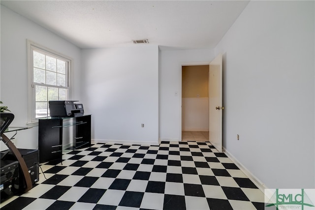 office area featuring light tile flooring