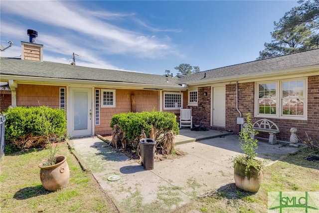 view of front of home with a patio area