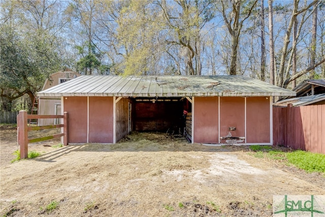 view of horse barn featuring an outdoor structure