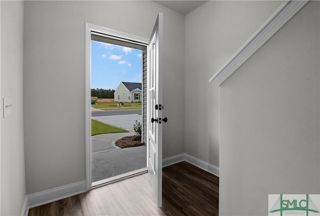 foyer entrance with hardwood / wood-style flooring