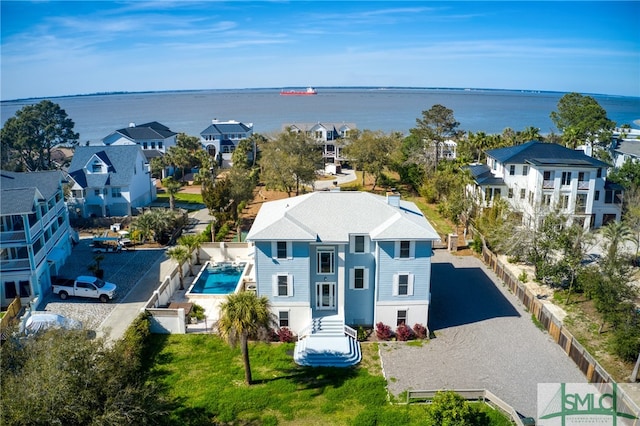 drone / aerial view featuring a water view