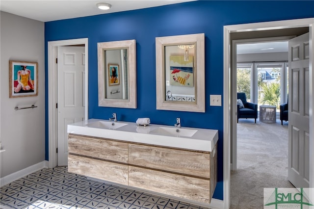 bathroom featuring tile floors and dual bowl vanity