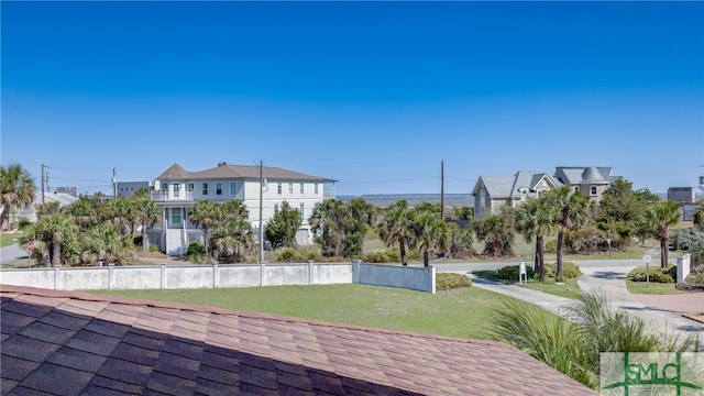 view of nearby features featuring a yard