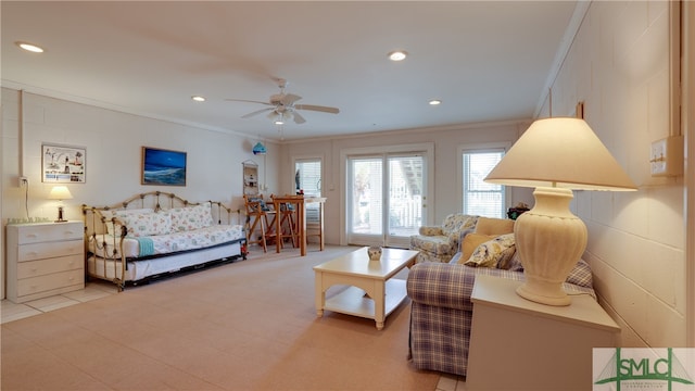 bedroom featuring light tile floors, ornamental molding, and ceiling fan