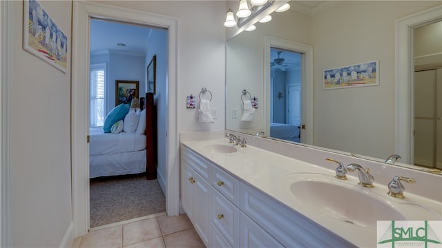 bathroom featuring double sink vanity, tile flooring, and ornamental molding