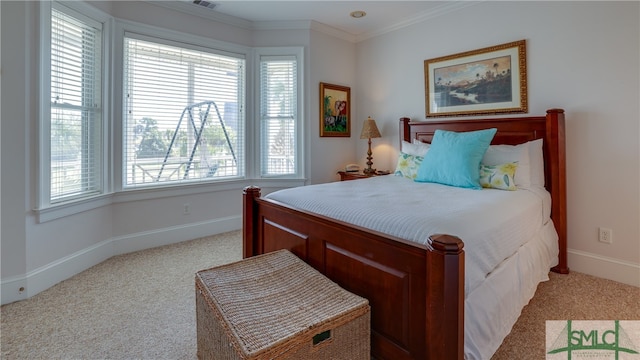 carpeted bedroom with crown molding and multiple windows