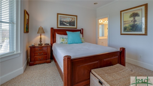 carpeted bedroom featuring ensuite bath, multiple windows, and crown molding