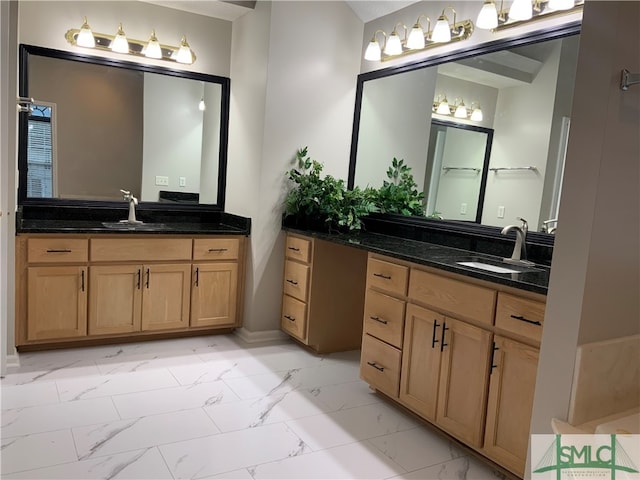 bathroom featuring tile floors and double vanity