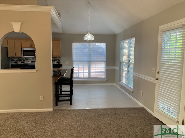 view of tiled dining space